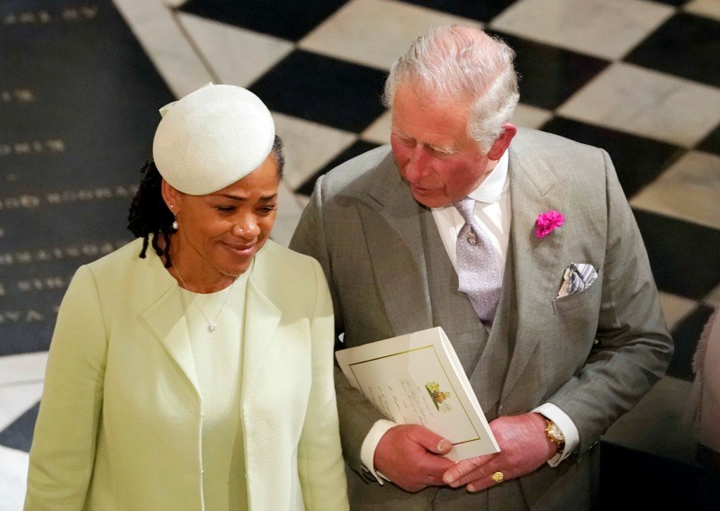 Prince Charles, Prince of Wales and Doria Ragland, mother of the bride, depar after the wedding of Prince Harry and Meghan Markle at St George's Chapel at Windsor Castle