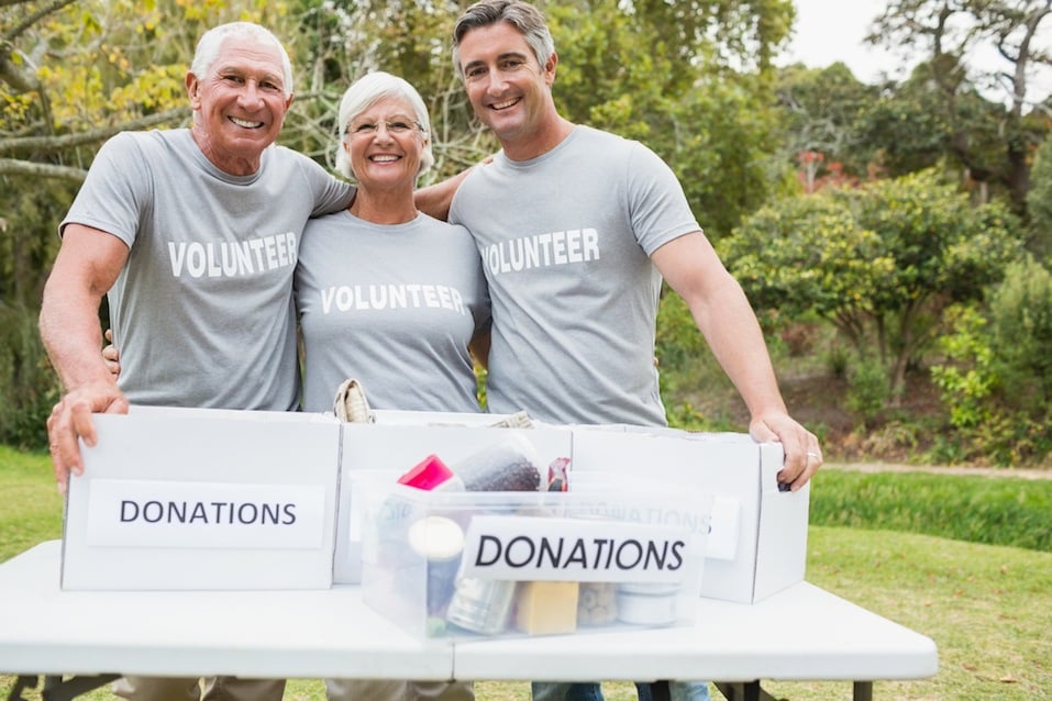 Happy family volunteer smiling at camera