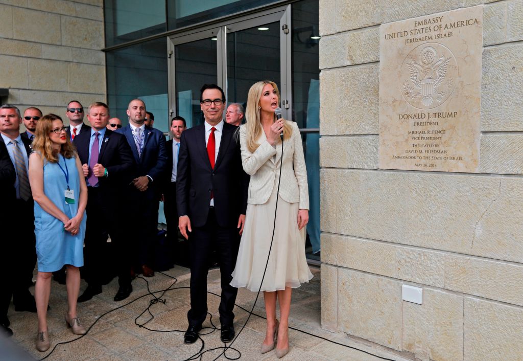 Steve Mnuchin and Ivanka Trump unveil an inauguration plaque during the opening of the US embassy