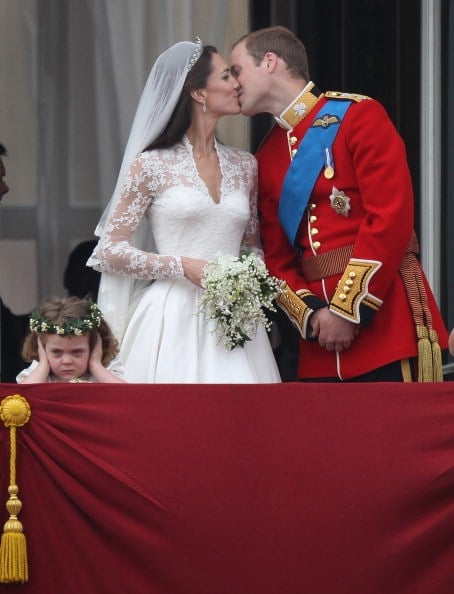 Prince William, Duke of Cambridge and Catherine, Duchess of Cambridge kiss as Bridesmaid Grace Van Cutsem (L) looks at the crowd Prince William, Duke of Cambridge and Catherine, Duchess of Cambridge kiss as Bridesmaid Grace Van Cutsem (L) looks at the crowd