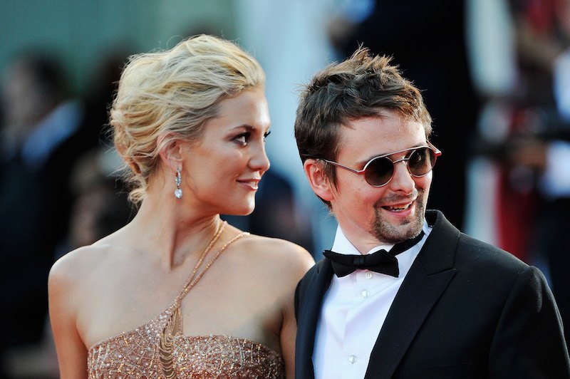 Kate Hudson and Matt Bellamy smiling at the paparazzi. Kate Hudson and Matt Bellamy smiling at the paparazzi.