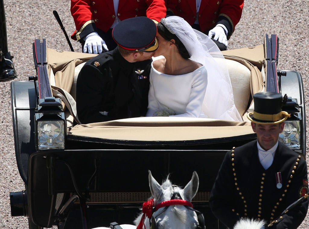 Meghan Markle and Prince Harry carriage kiss