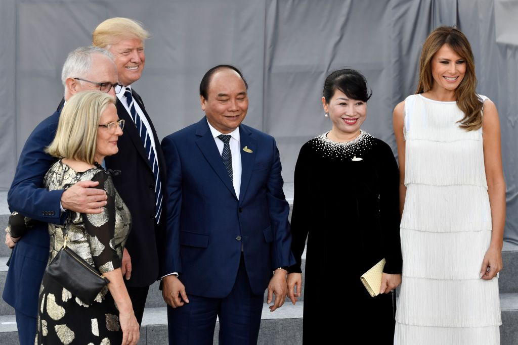 Australia's Prime Minister Malcolm Turnbull and his wife Lucy, US President Donald Trump, Vietnam's Prime Minister Nguyen Xuan Phuc and his wife Tran Nguyet Thu pose with US First Lady Melania Trump