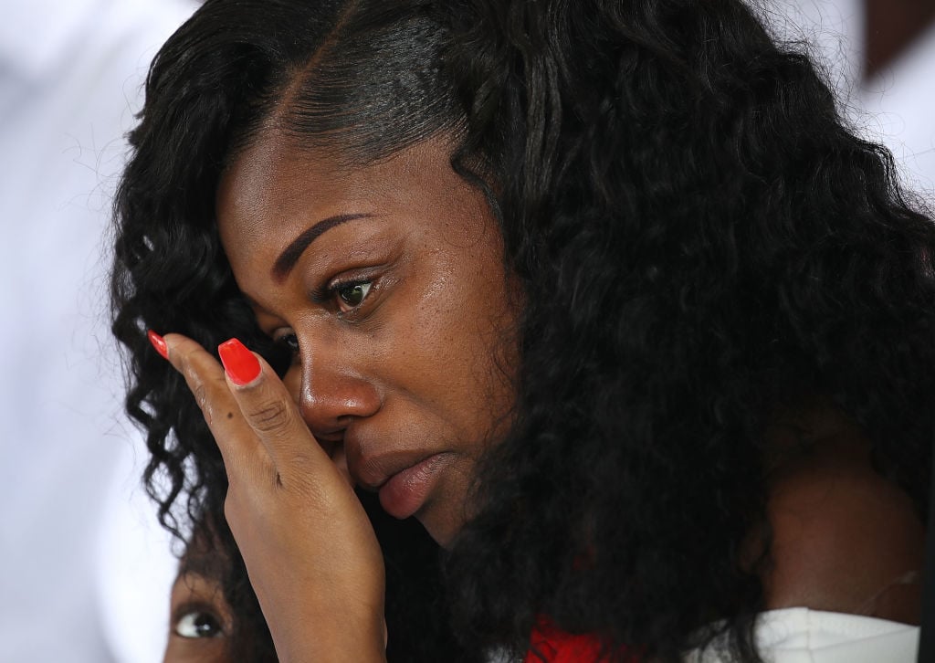  Myeshia Johnson wipes away tears during the burial service for her husband U.S. Army Sgt. La David Johnson