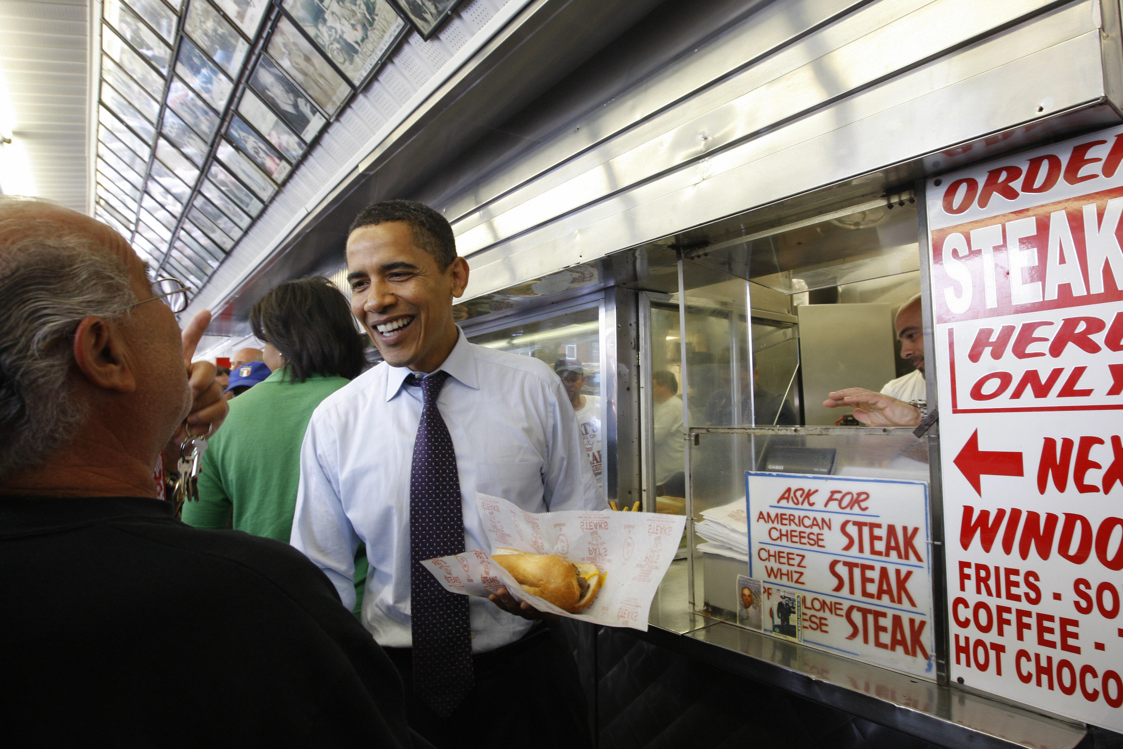US Democratic presidential candidate Illinois Senator Barack Obama pays a visit to Pat's King of Steaks