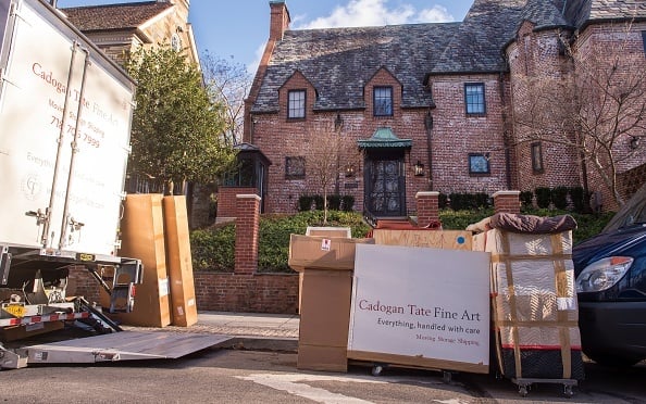 A moving truck is seen outside the new home of outgoing US President Barack Obama A moving truck is seen outside the new home of outgoing US President Barack Obama
