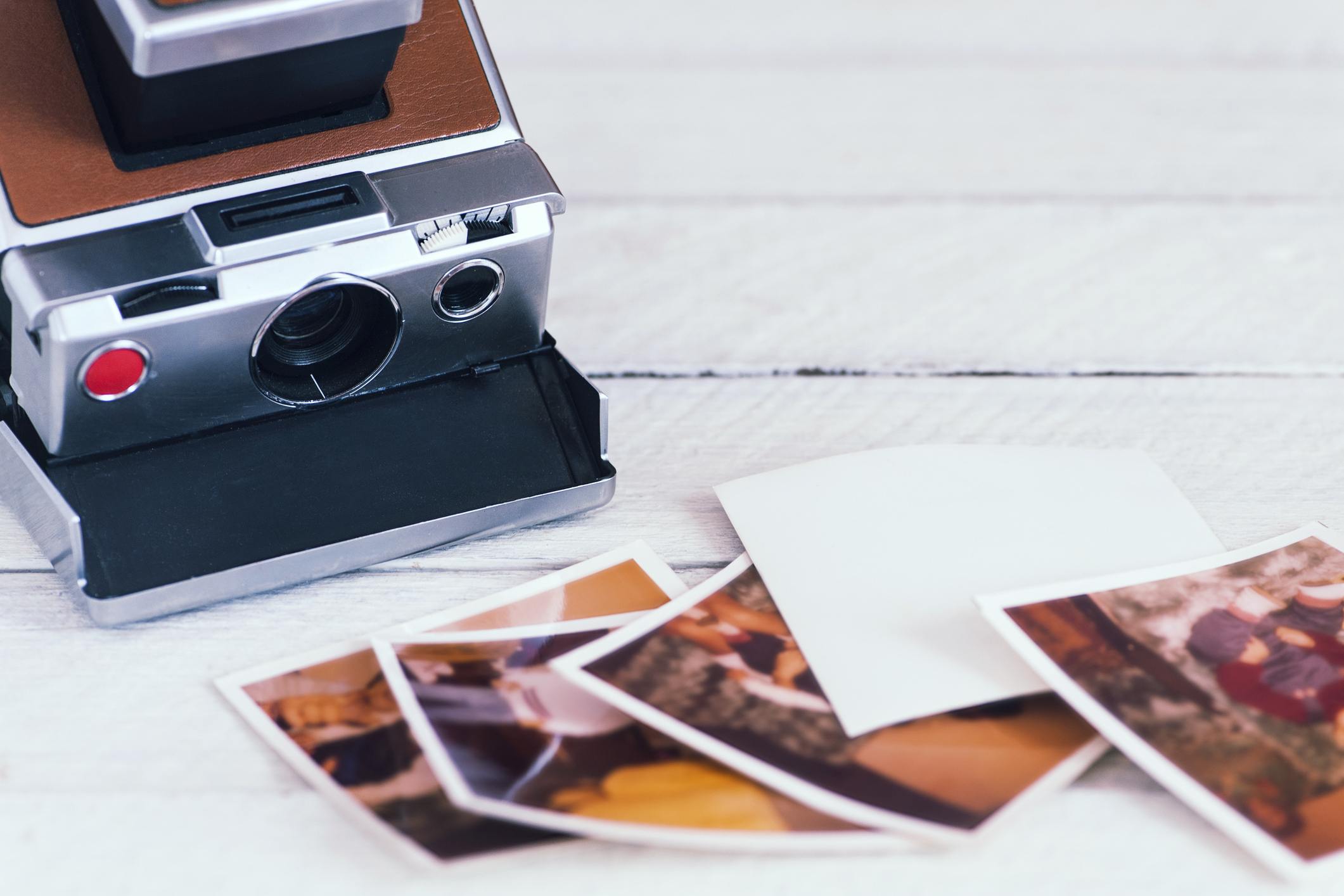 Polaroid camera with photos