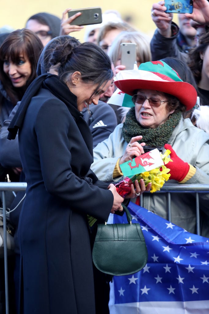 Meghan Markle greeting a fan