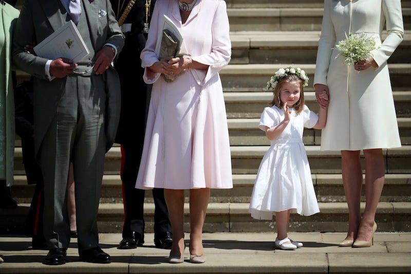 Princess Charlotte waving to the public. 