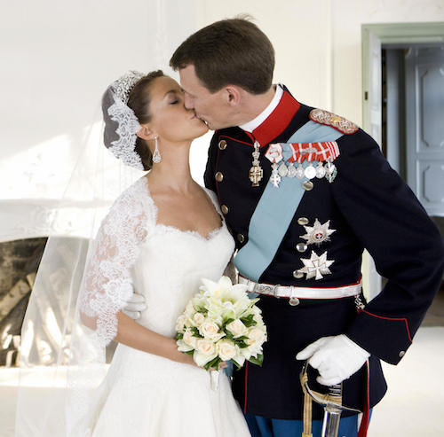 Prince Joachim of Denmark, Queen Margrethe's youngest son, kisses his bride, French Marie Cavallier, now Princesss Marie of Denmark, in this official photo. Prince Joachim of Denmark, Queen Margrethe's youngest son, kisses his bride, French Marie Cavallier, now Princesss Marie of Denmark, in this official photo.