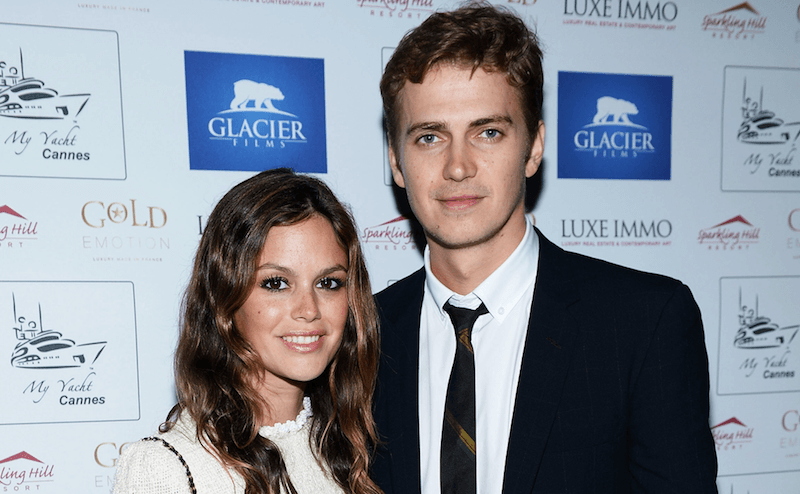 Rachel Bilson and Hayden Christensen posing on a red carpet together. Rachel Bilson and Hayden Christensen posing on a red carpet together.