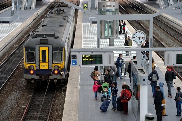 Passengers wait at the Liege-Guillemins railway station during a spontaneous strike Passengers wait at the Liege-Guillemins railway station during a spontaneous strike