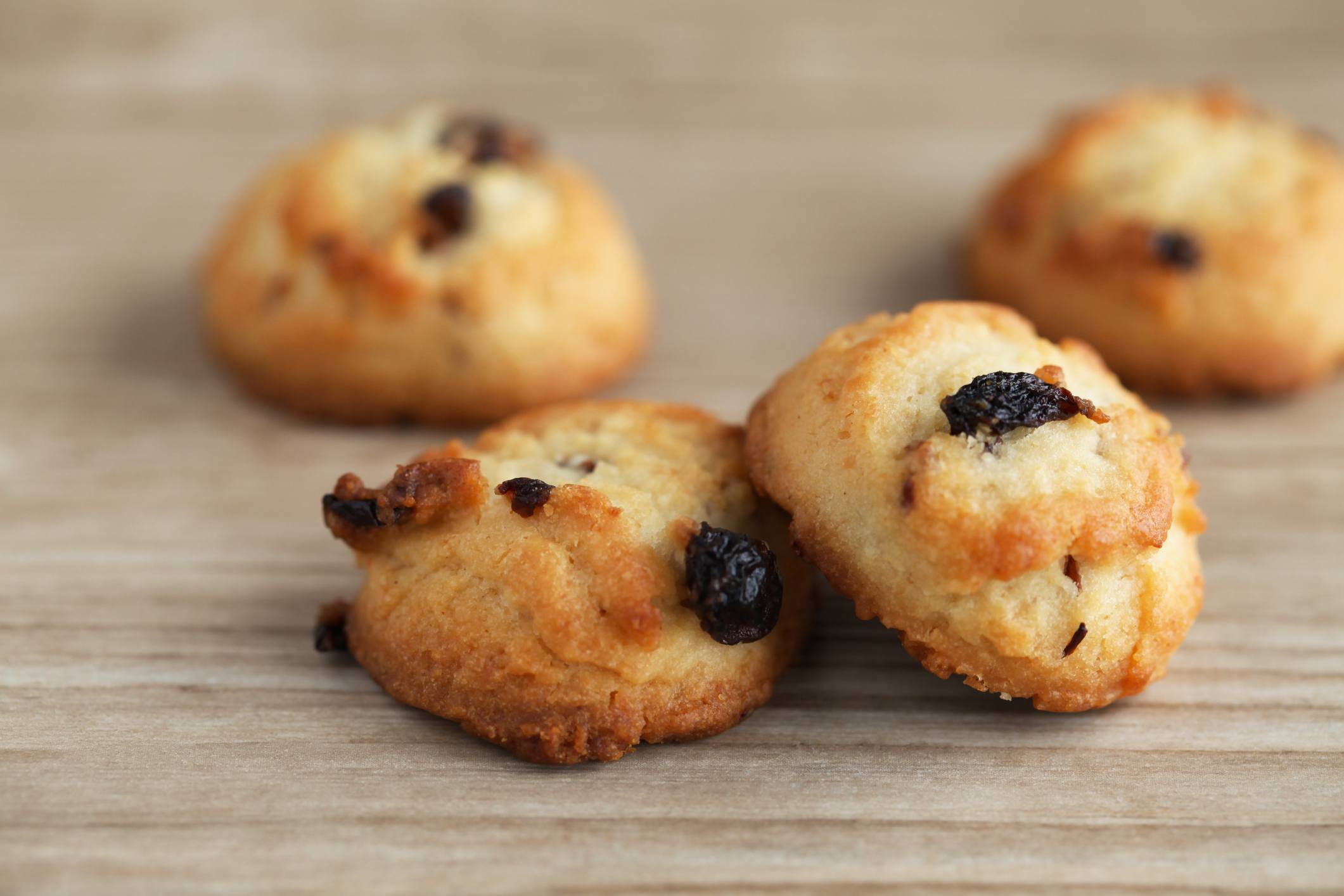 biscuit raisin cookies isolated on wood table