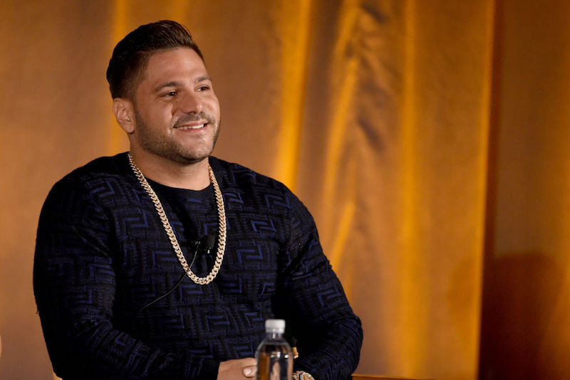 Ronnie Ortiz-Magro sitting in front of a bright yellow curtain. Ronnie Ortiz-Magro sitting in front of a bright yellow curtain.