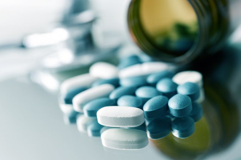 A pill bottle with Xanax and another drug inside