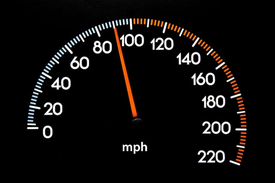 Speedometer with needle displaying 90 mphF