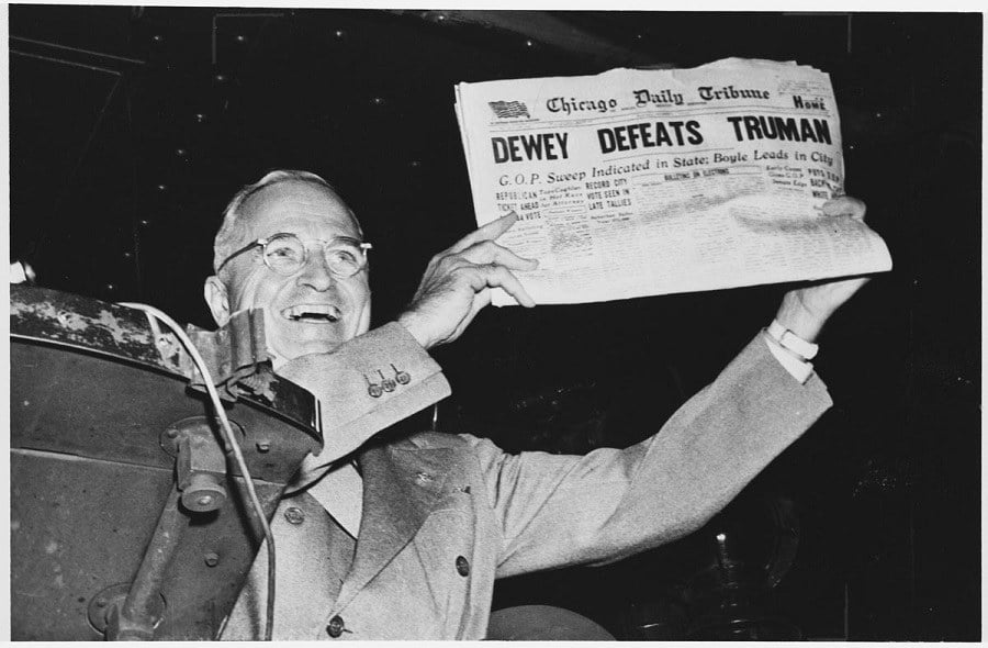 Truman with newspaper Truman with newspaper