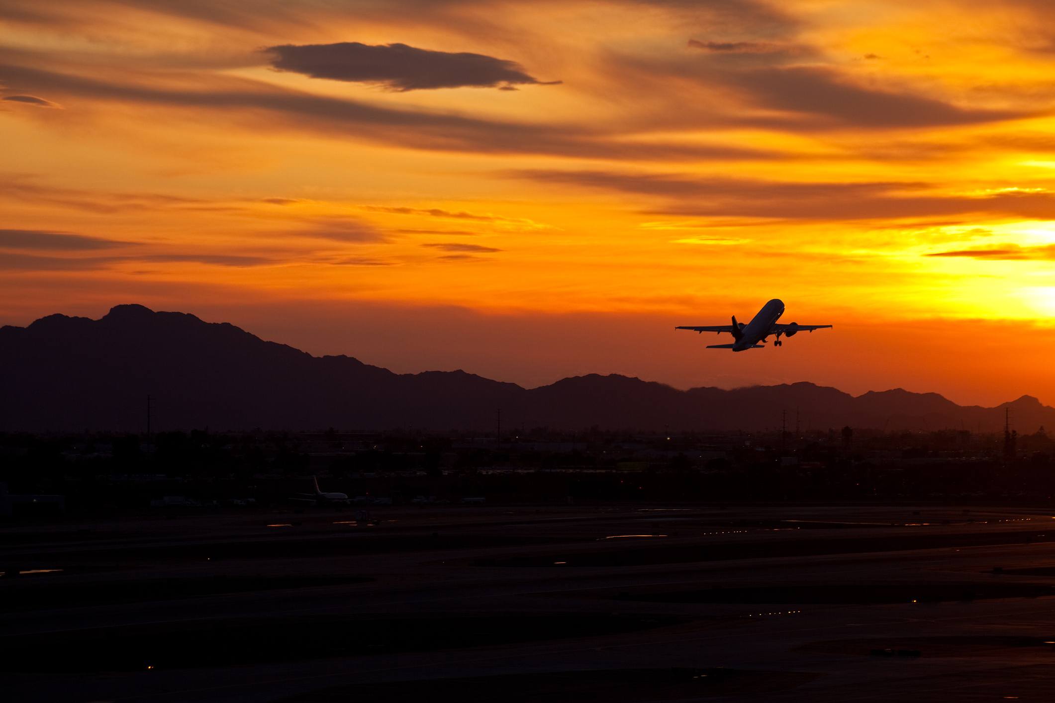 Airplane in the sunset