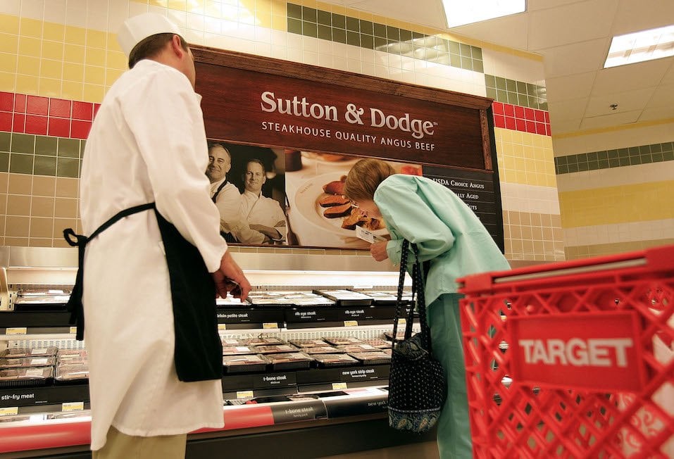 butcher helping customer