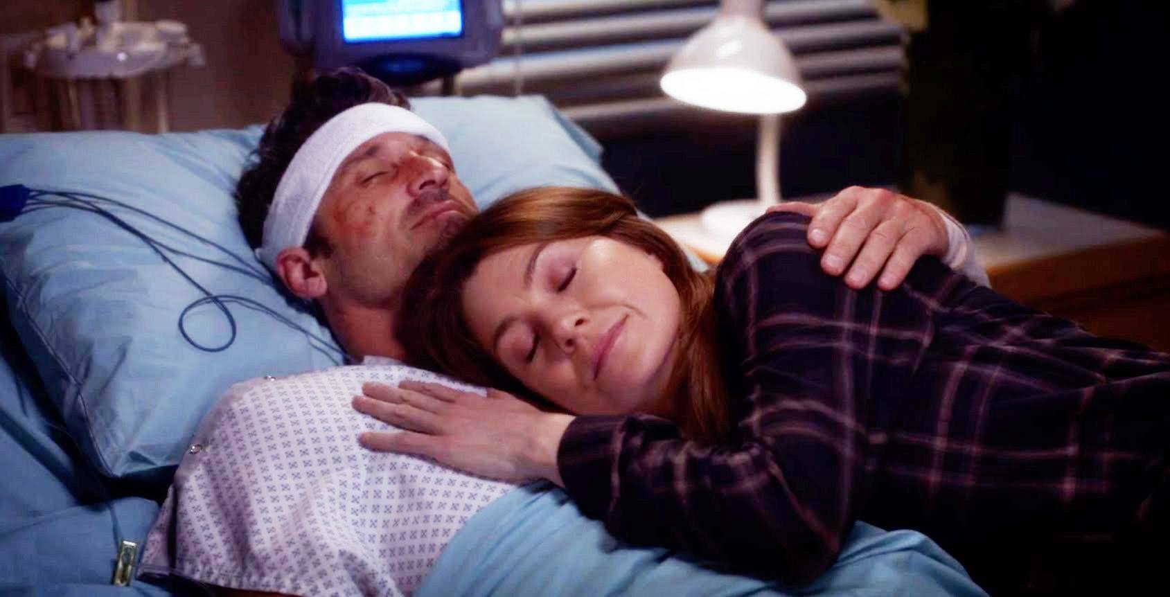 Derek holding Meredith on his death bed in Grey's Anatomy