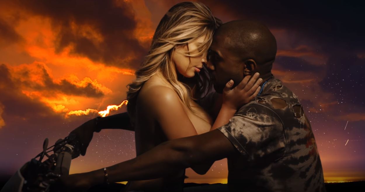 Kim Kardashian and Kanye West in the "Bound 2" music video Kim Kardashian and Kanye West in the "Bound 2" music video