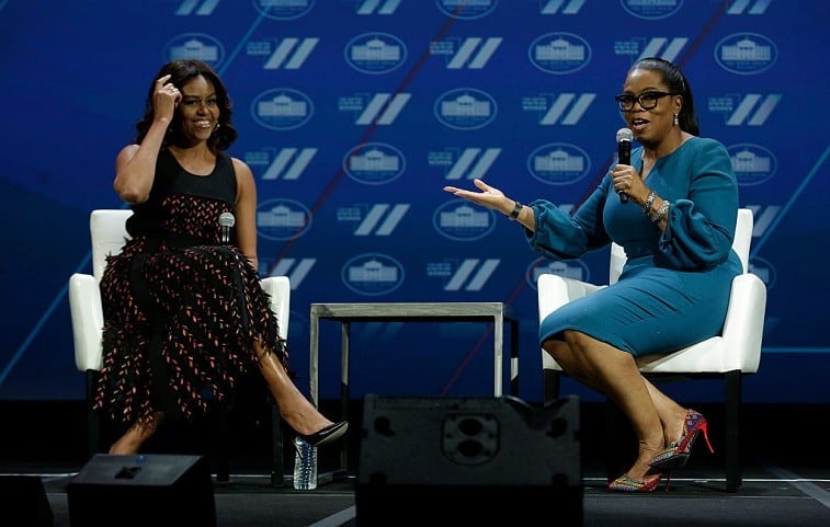 US First lady Michelle Obama (L) and Oprah Winfrey speak at the White House Summit on the United State of Women in Washington, DC on June 14, 2016.
