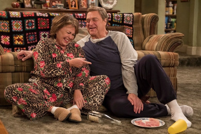 Roseanne and Dan in their living room. Roseanne and Dan in their living room.