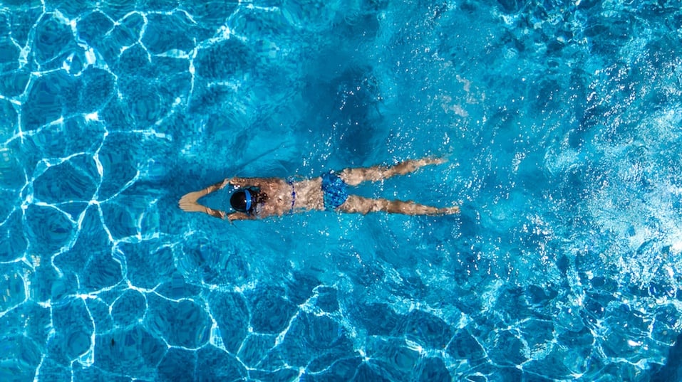 woman in swimming pool water