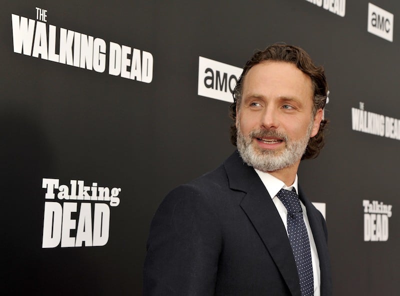 Andrew Lincoln posing on a red carpet. 