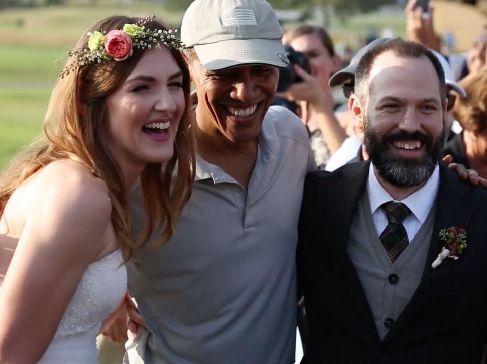 Barack Obama poses with the newlyweds.