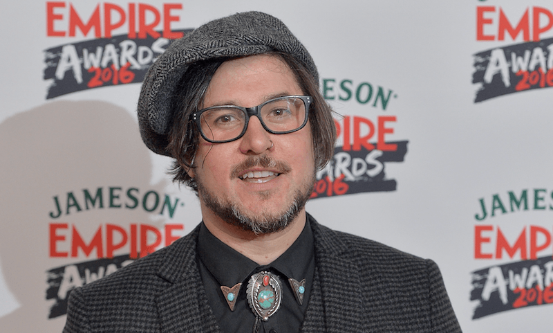 Corin Hardy on a red carpet. Corin Hardy on a red carpet.