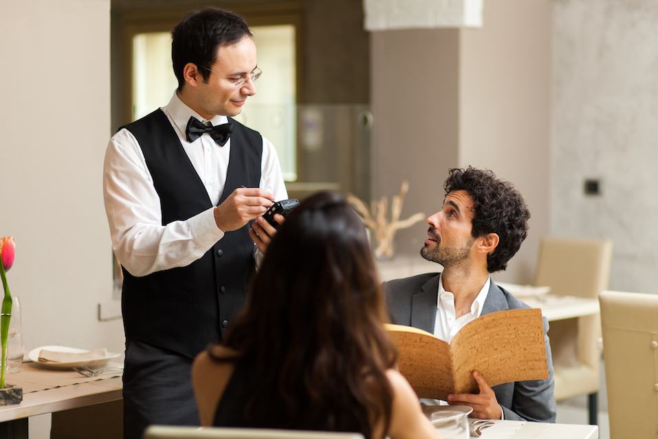 couple having dinner Waiter taking order