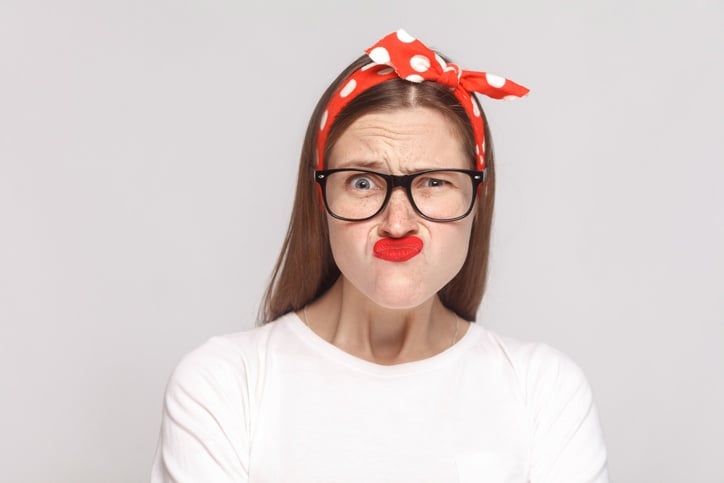 Hipster woman wearing glasses and a headband