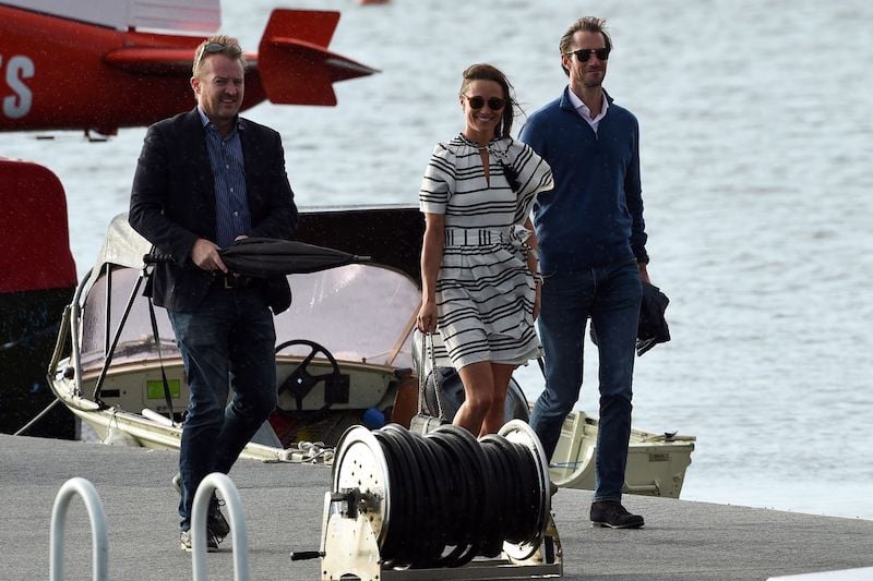 Pippa Middleton (C) and her husband James Matthews (R) arrive at Rose Bay Wharf by sea plane in Sydney on May 31, 2017.<br /> Pippa Middleton (C) and her husband James Matthews (R) arrive at Rose Bay Wharf by sea plane in Sydney on May 31, 2017.<br />
