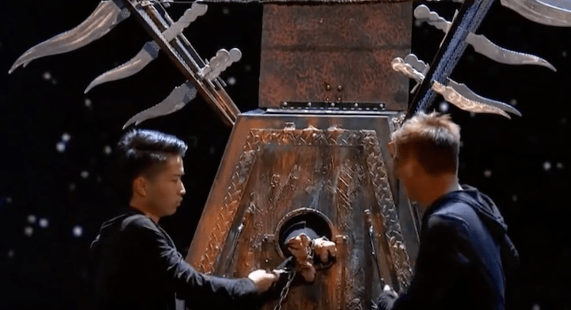 Hara demonstrating his magic trick. Hara demonstrating his magic trick.