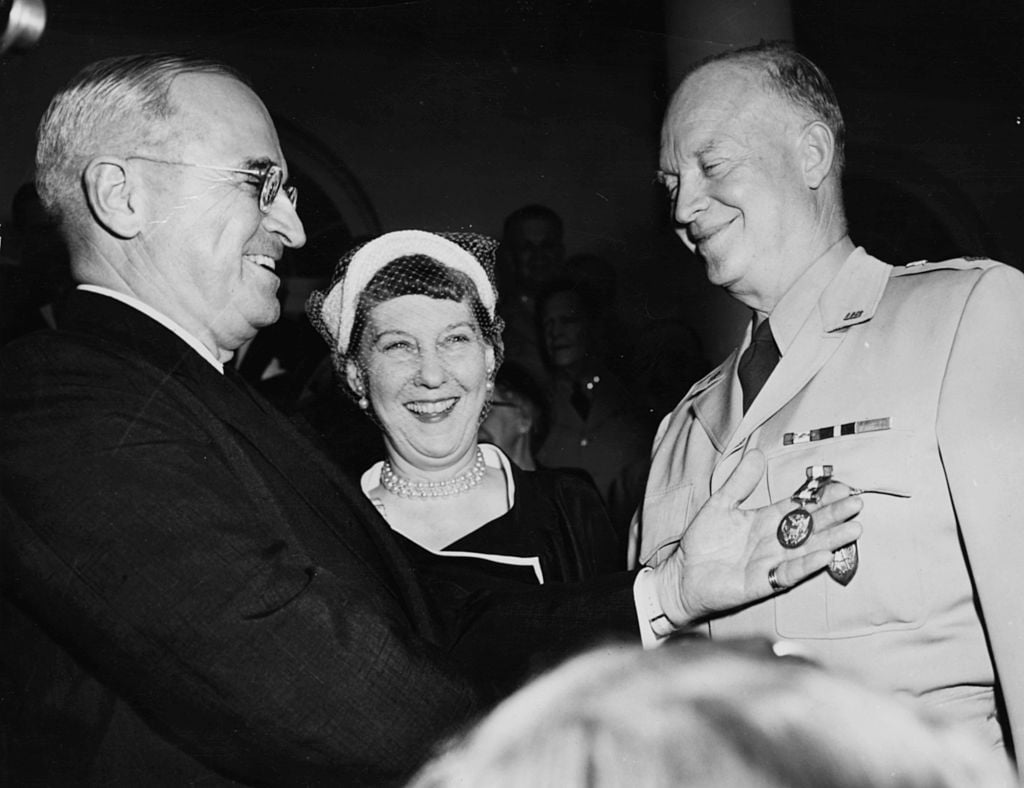 Mamie Eisenhower looks on, at the White House