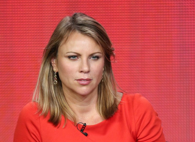 Lara Logan sitting in front of a red background. Lara Logan sitting in front of a red background.