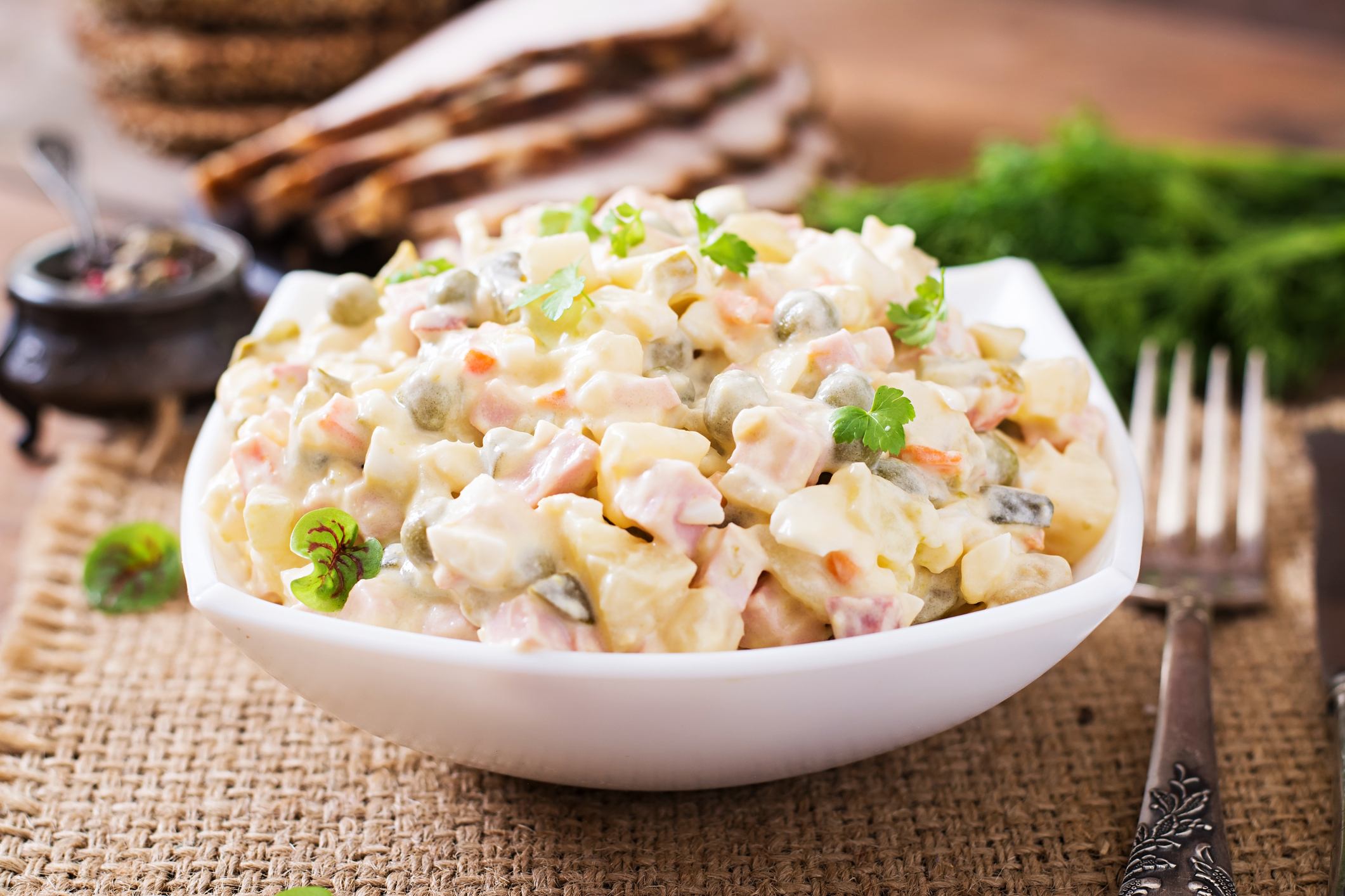 Traditional Russian mayonnaise salad "Olivier"