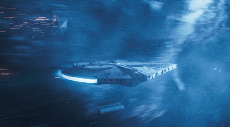 The Millennium Falcon flying at high speed. 