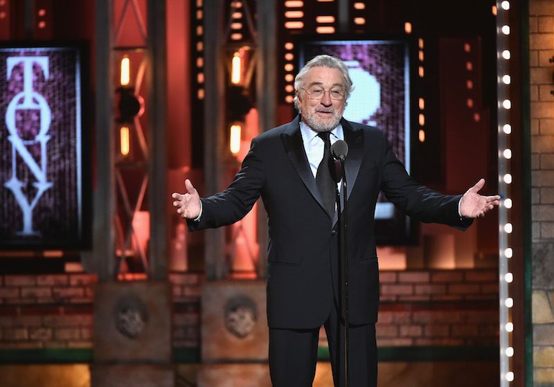 Robert De Niro speaking on stage. Robert De Niro speaking on stage.