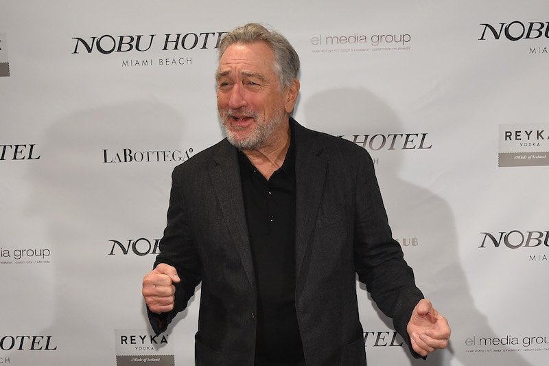 Robert De Niro posing on a red carpet. Robert De Niro posing on a red carpet.