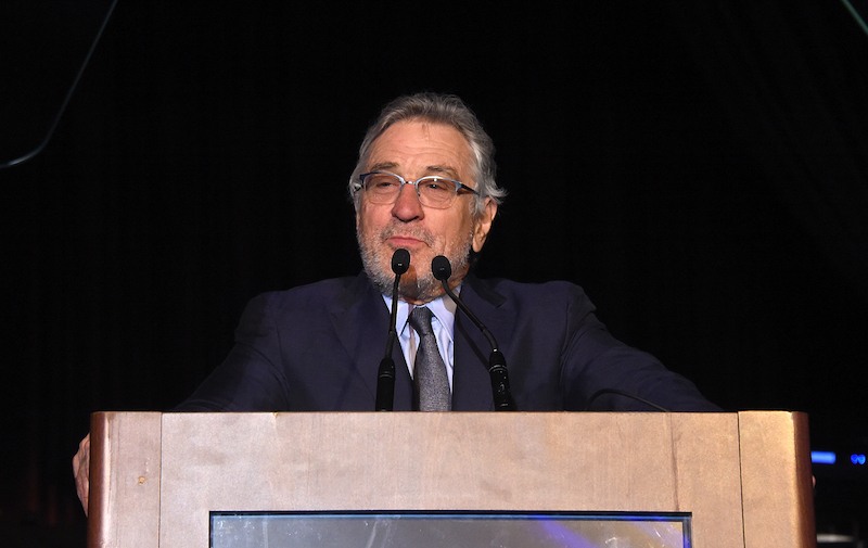Robert De Niro behind a podium. Robert De Niro behind a podium.
