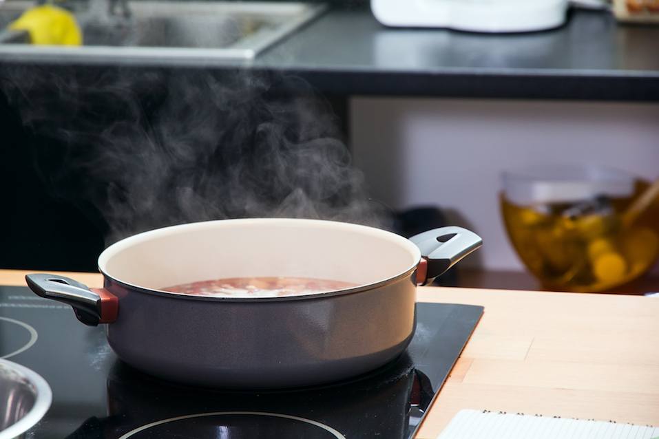 Pot steaming on the stove pot steaming on the stove