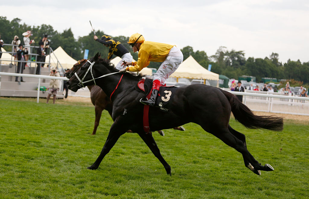 Frankie Dettori riding Undrafted and runner up Craig A. Williams riding Brazen Beau during day 5 of Royal Ascot