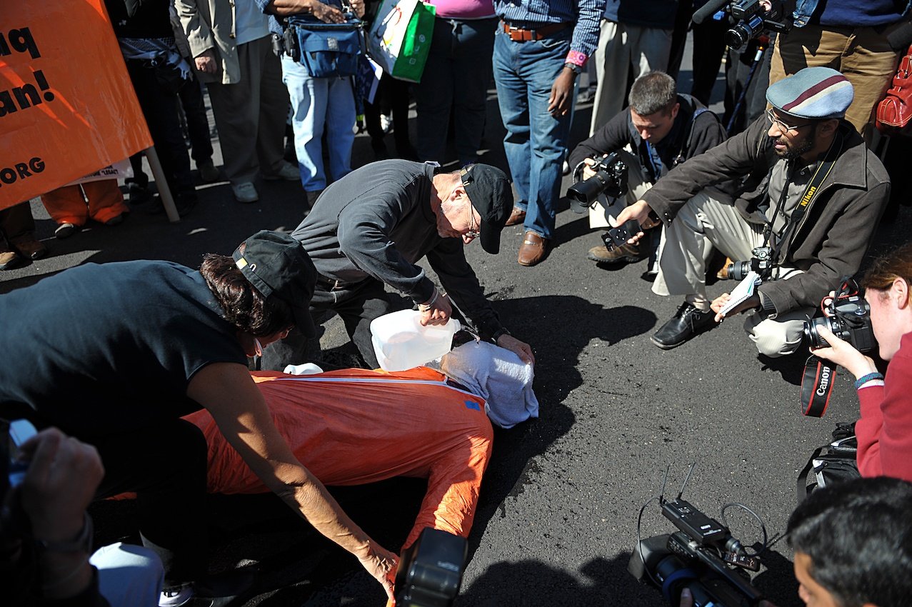 Anti-war activists demonstrate waterboar
