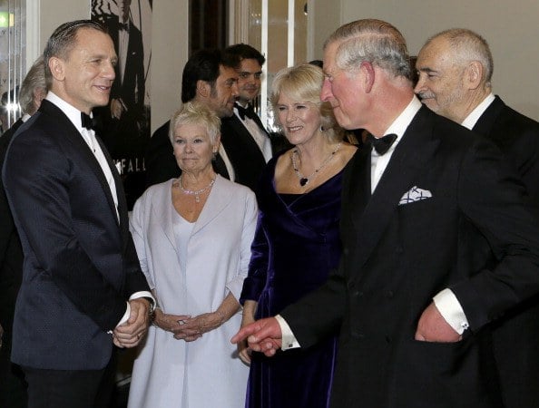 Prince Charles and Camilla meet British actors Daniel Craig and Judi Dench.