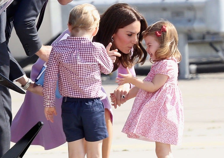 Prince William, Duke of Cambridge, Catherine, Duchess of Cambridge, Prince George of Cambridge and Princess Charlotte of Cambridge view helicopter models H145 and H135 before departing from Hamburg airport on the last day of their official visit to Poland and Germany on July 21, 2017 in Hamburg, Germany.