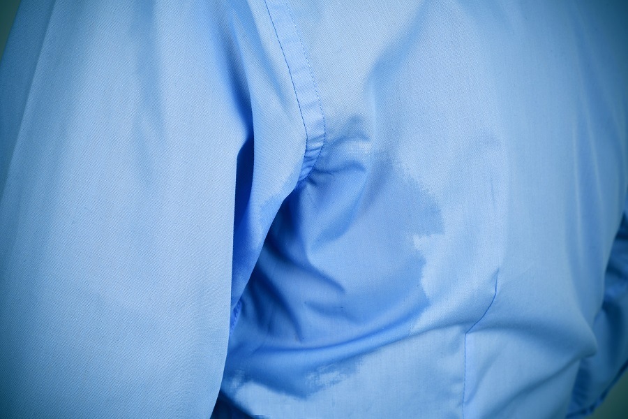 blue shirt with an underarm sweat stain blue shirt with an underarm sweat stain