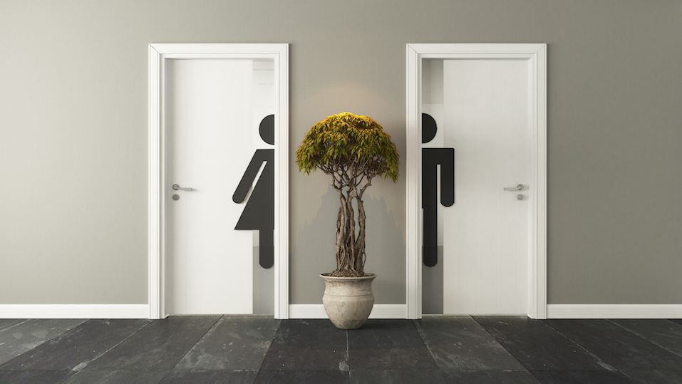 White men's and women's restroom doors