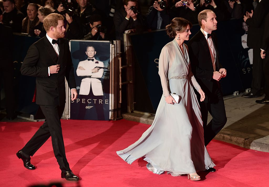 Prince William, Kate Middleton, and Prince Harry arrive on the red carpet.